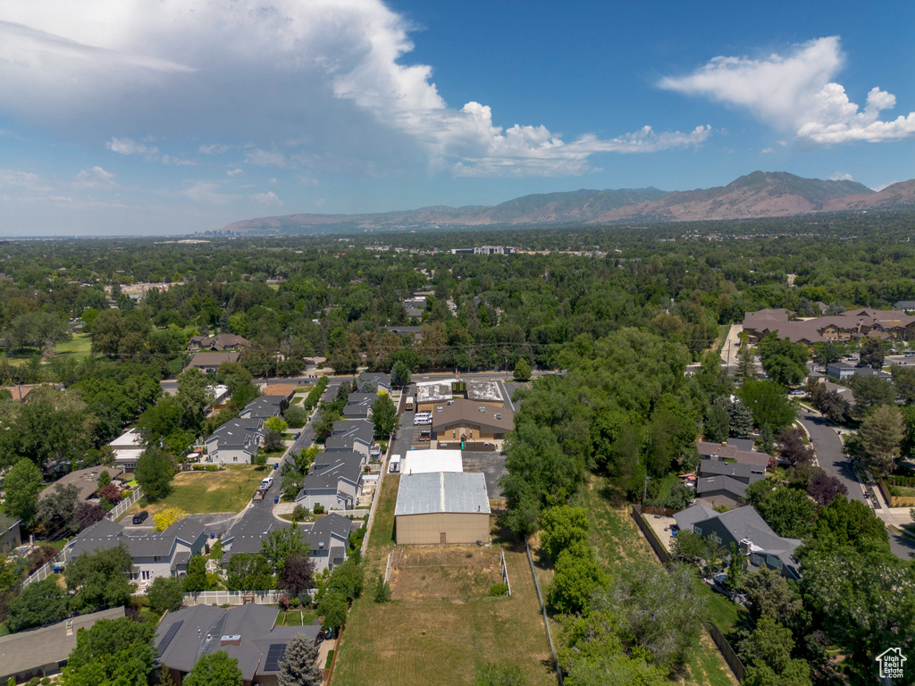 Aerial view of residential area with a mountainous background
