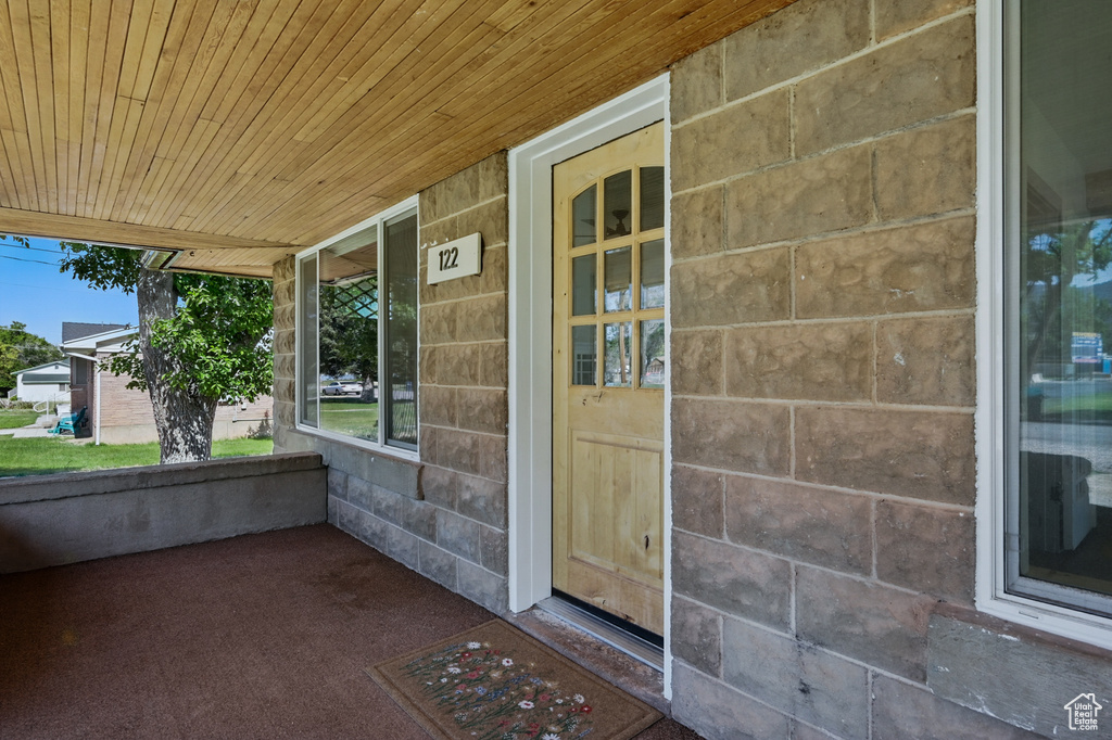 Property entrance with a porch