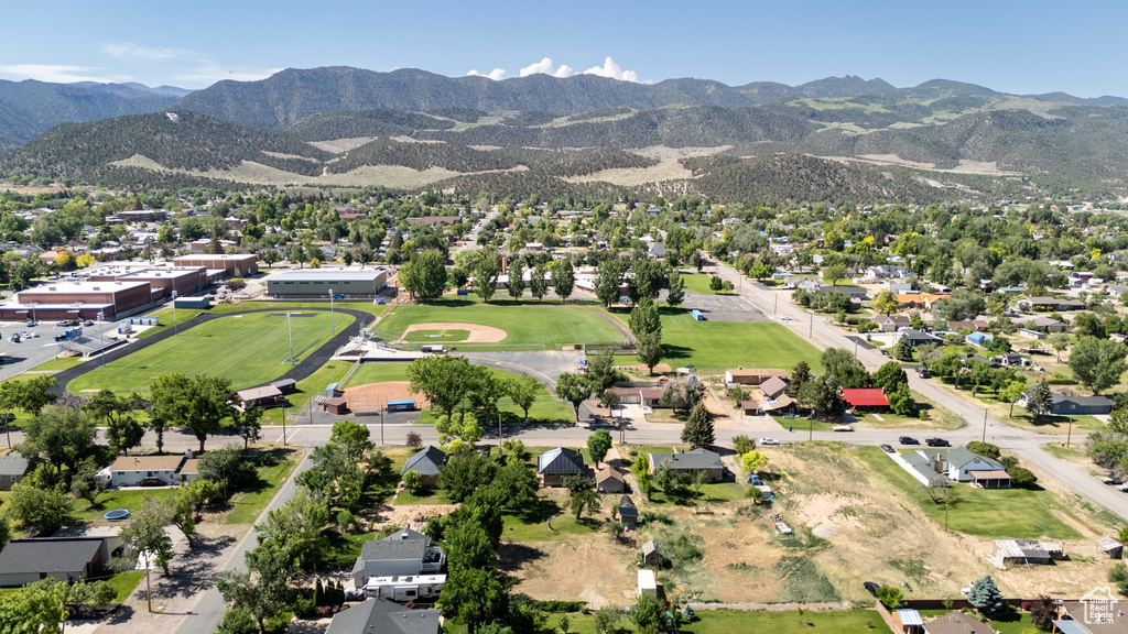 Aerial view of residential area featuring mountains