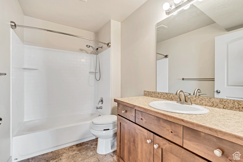 Full bathroom with vanity and shower / washtub combination