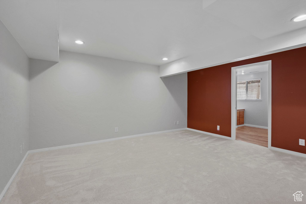 Basement featuring carpet and recessed lighting