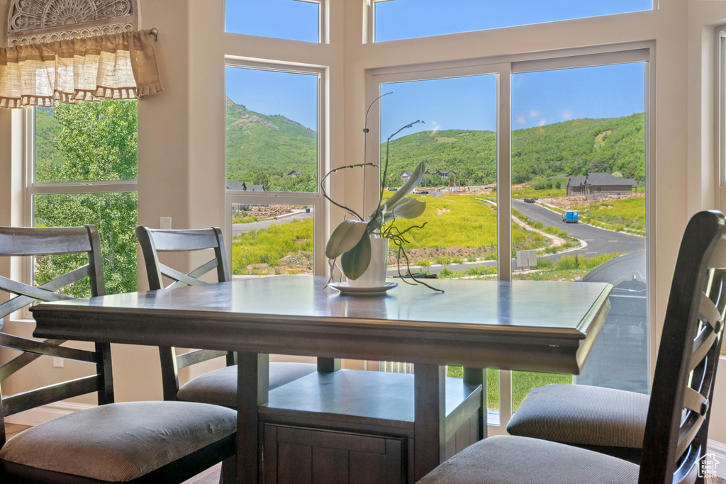 Dining area featuring a mountain view