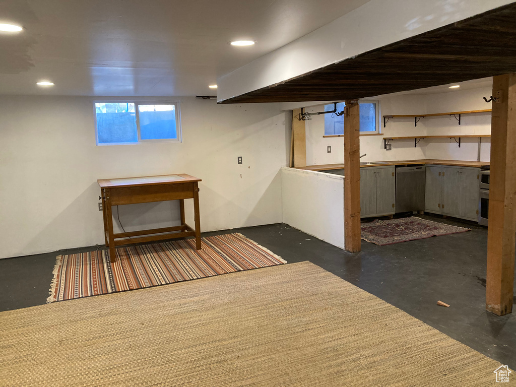 Basement featuring recessed lighting