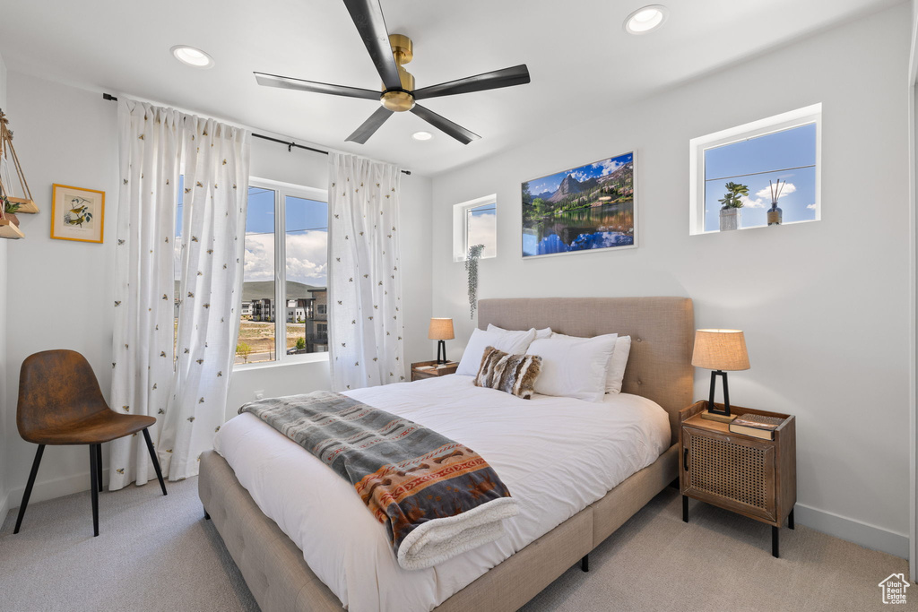 Bedroom featuring carpet flooring, recessed lighting, and a ceiling fan