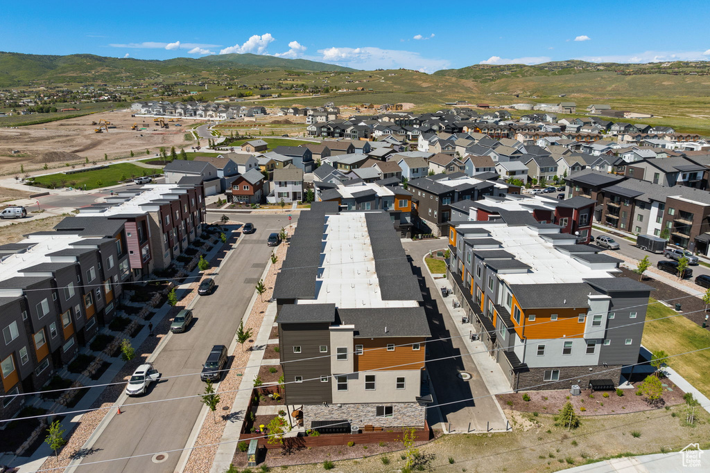 Aerial perspective of suburban area with mountains