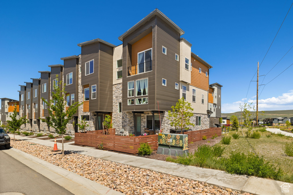 View of building exterior with a residential view