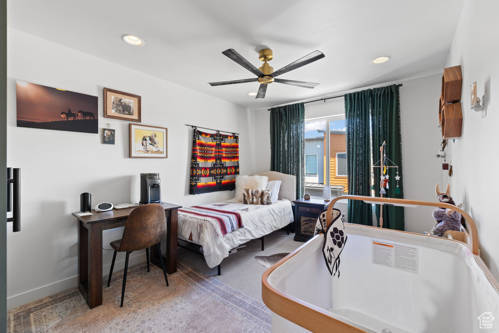 Bedroom featuring recessed lighting, a ceiling fan, and a desk