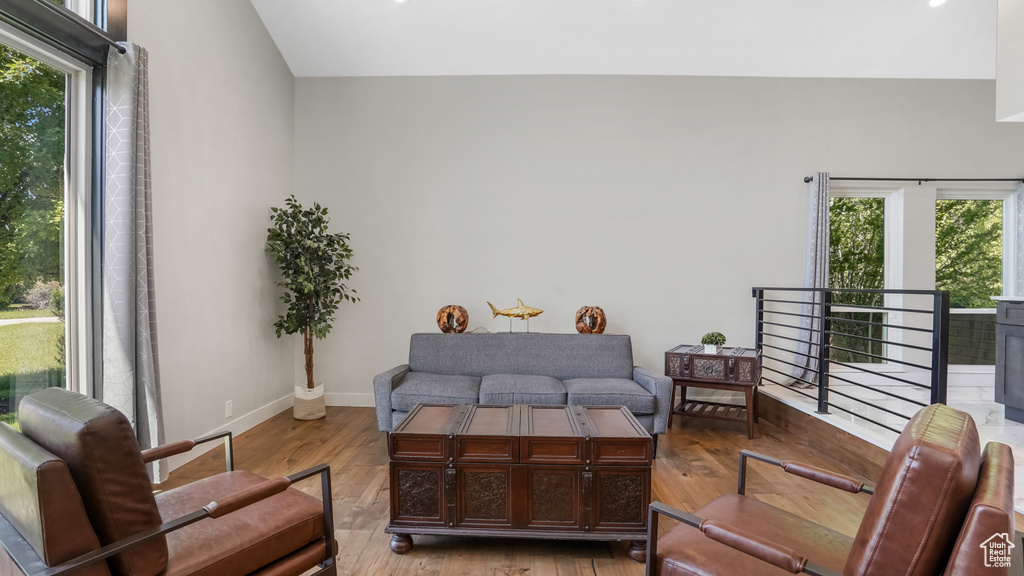 Bedroom featuring wood finished floors and baseboards