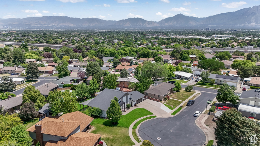 Aerial view of residential area with mountains