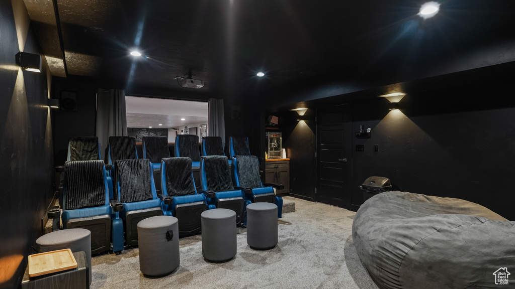 Carpeted cinema with recessed lighting