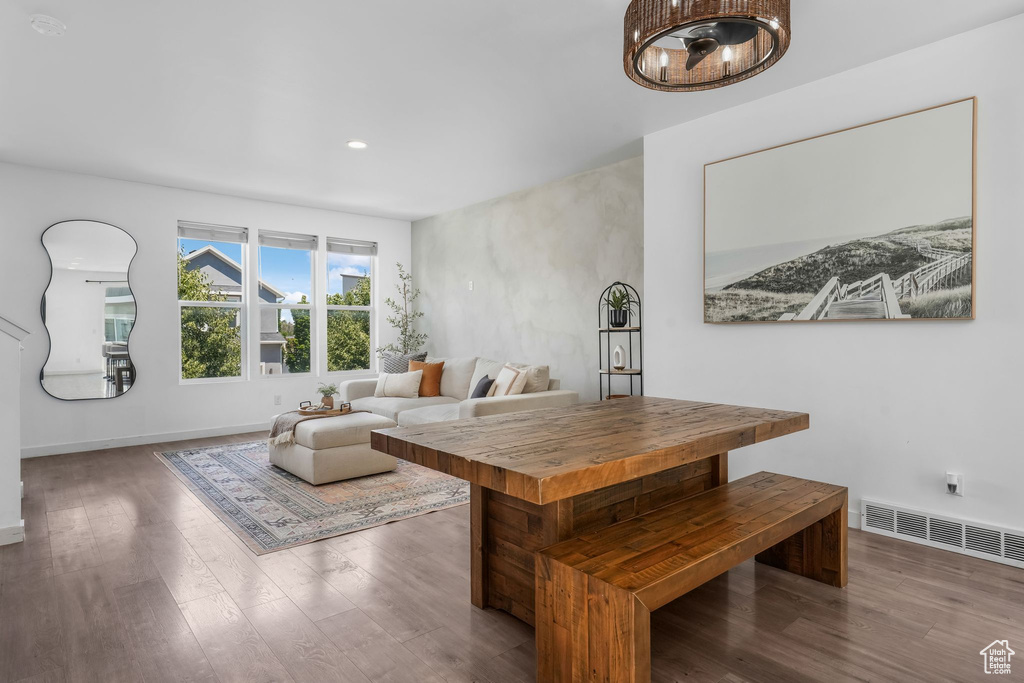 Living room featuring wood finished floors and recessed lighting