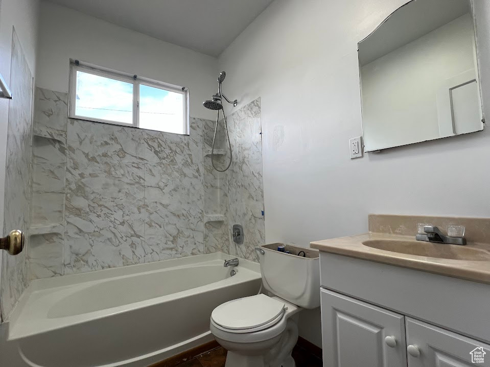 Full bath featuring  shower combination and vanity
