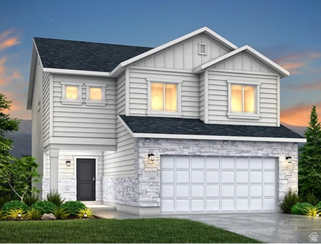 Contemporary home with stone siding, a garage, board and batten siding, concrete driveway, and roof with shingles
