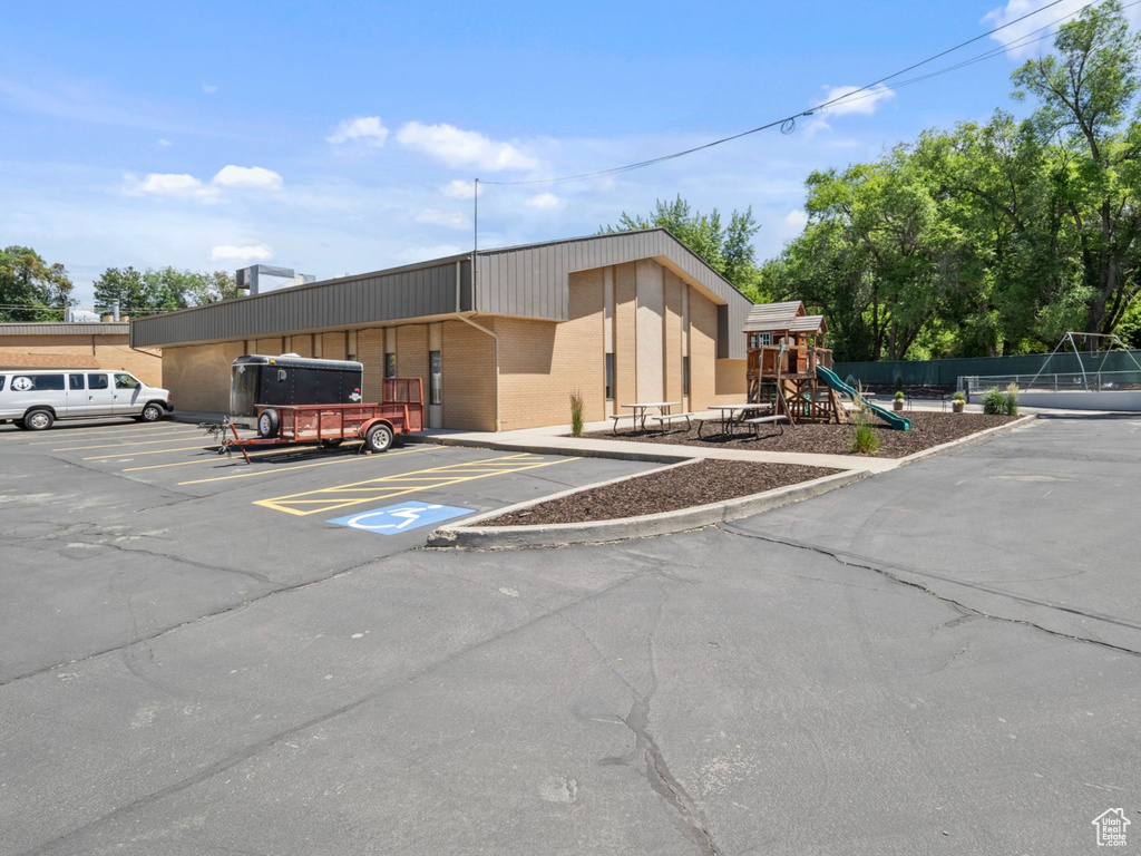 View of home\\\'s exterior with uncovered parking