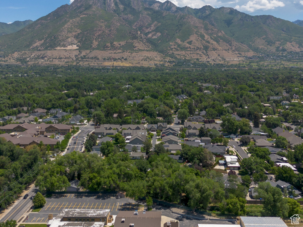 Aerial view of residential area featuring mountains