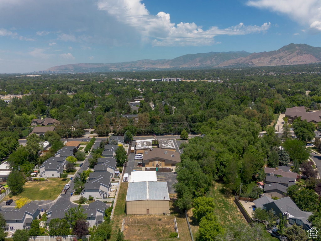 Aerial view of residential area with a mountainous background