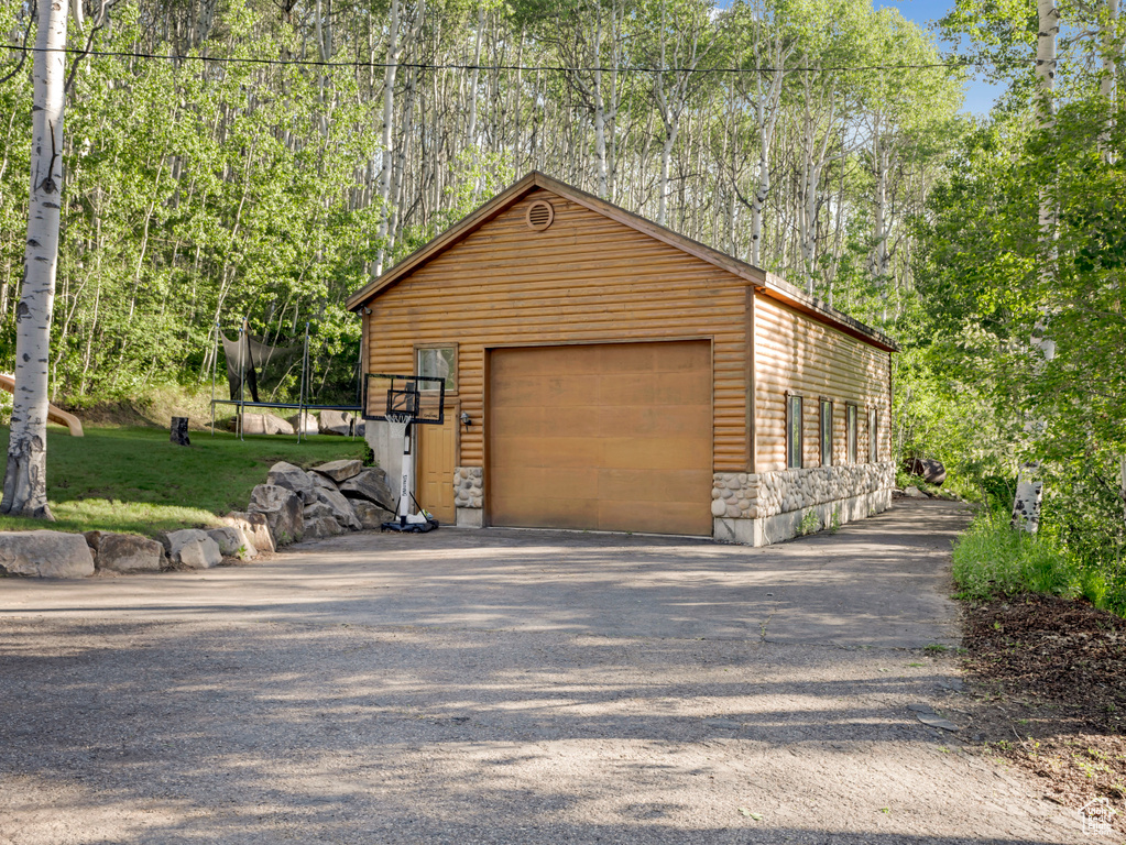 Detached garage with driveway
