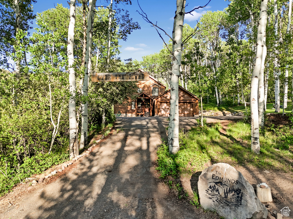 View of front of house featuring driveway and a garage
