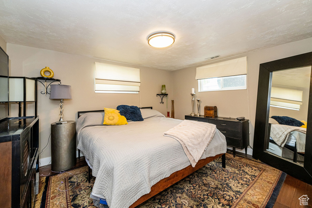 Bedroom featuring wood finished floors