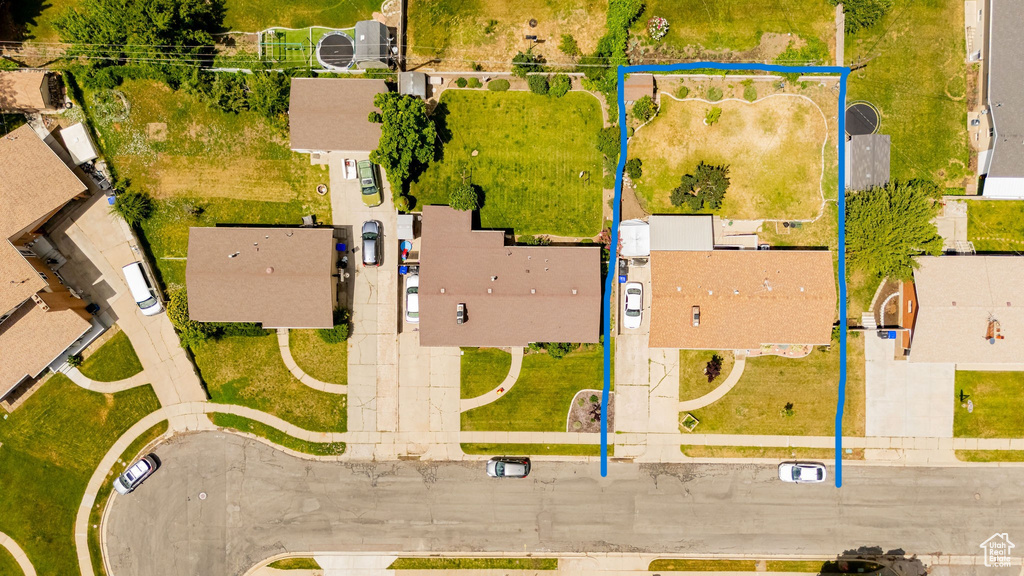 Aerial perspective of suburban area with property boundaries highlighted
