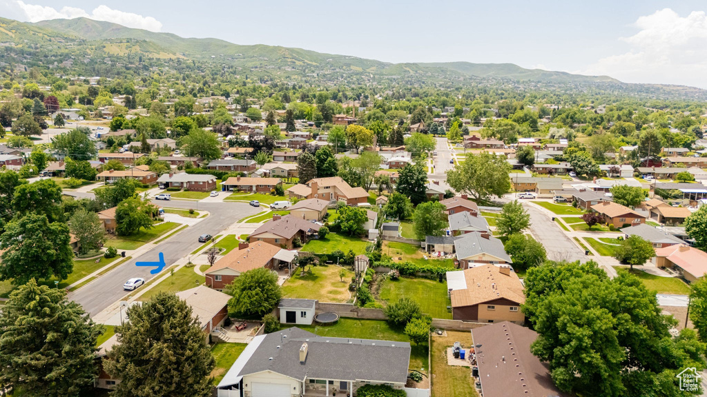 Aerial view of residential area with mountains