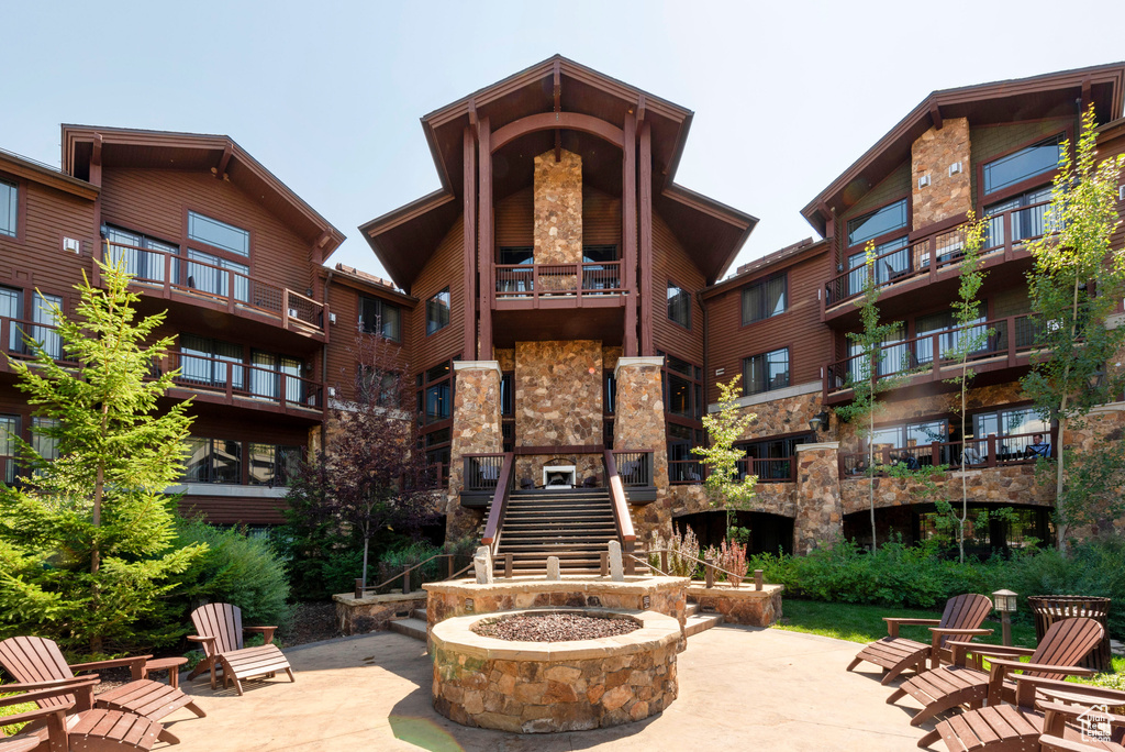 View of apartment building / complex featuring stairs