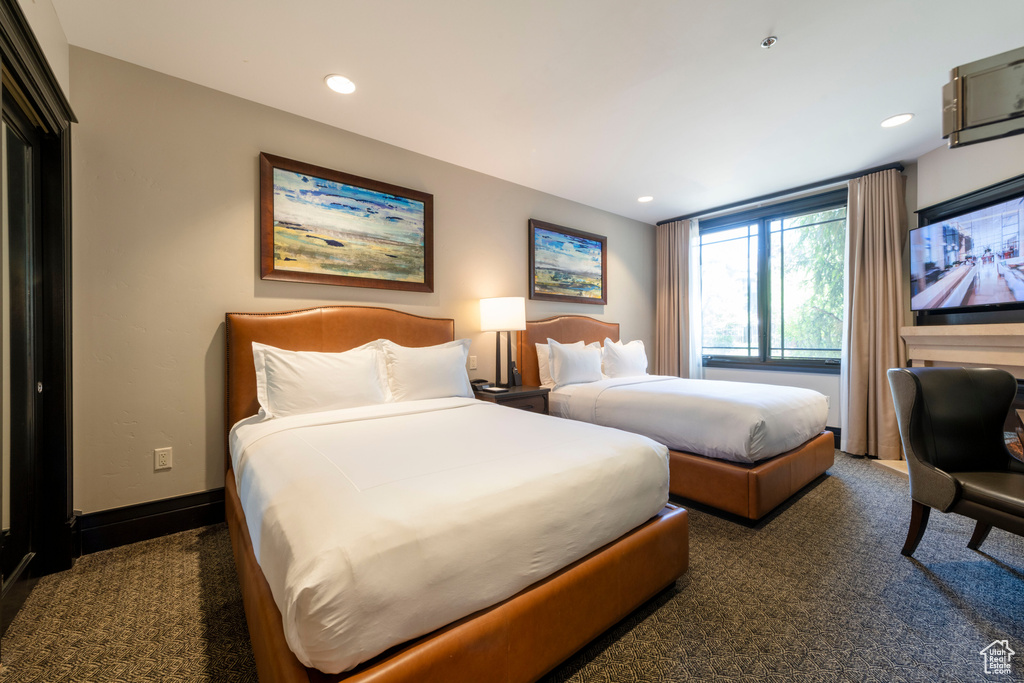 Carpeted bedroom featuring recessed lighting