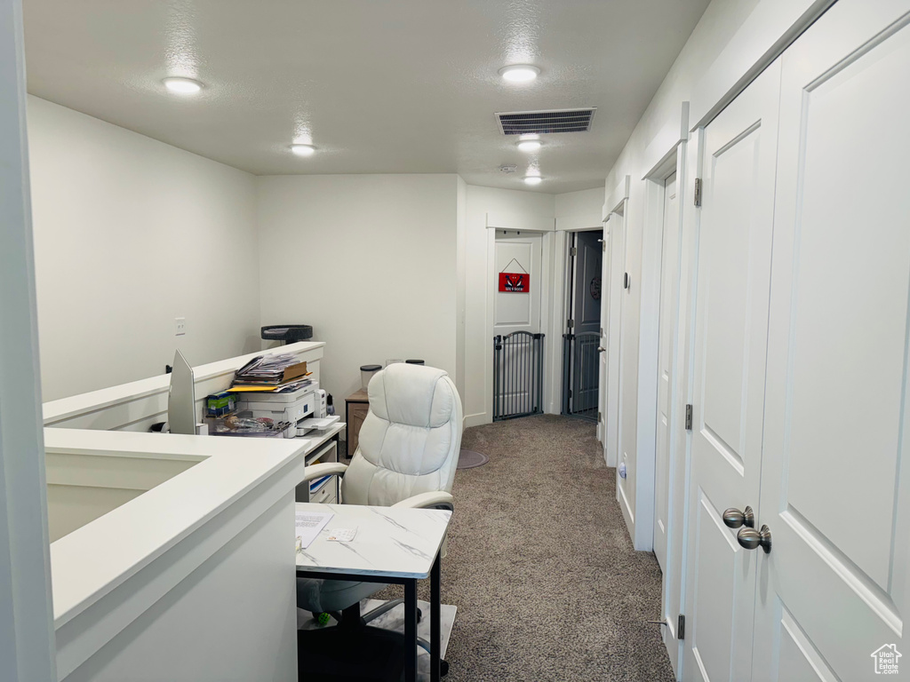 Office area featuring carpet