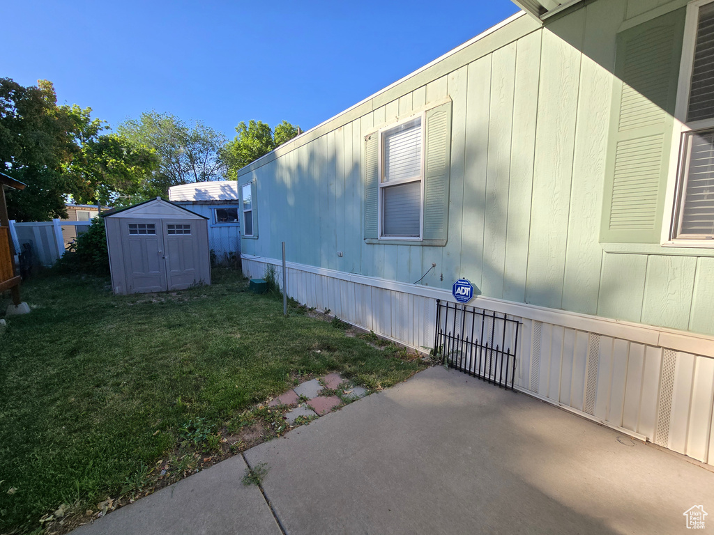 View of property exterior featuring a patio