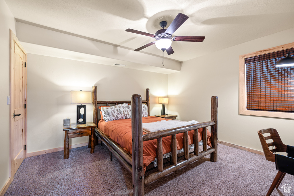 Bedroom with carpet and a ceiling fan
