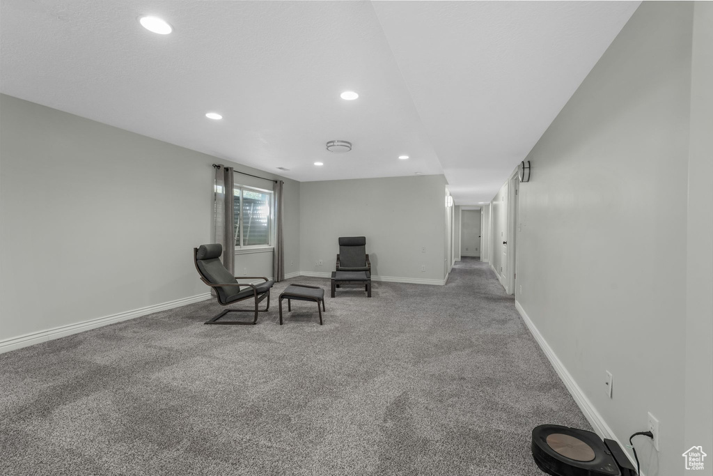 Living area featuring recessed lighting and carpet floors