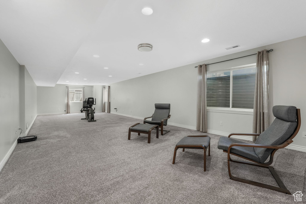 Sitting room featuring carpet floors and recessed lighting
