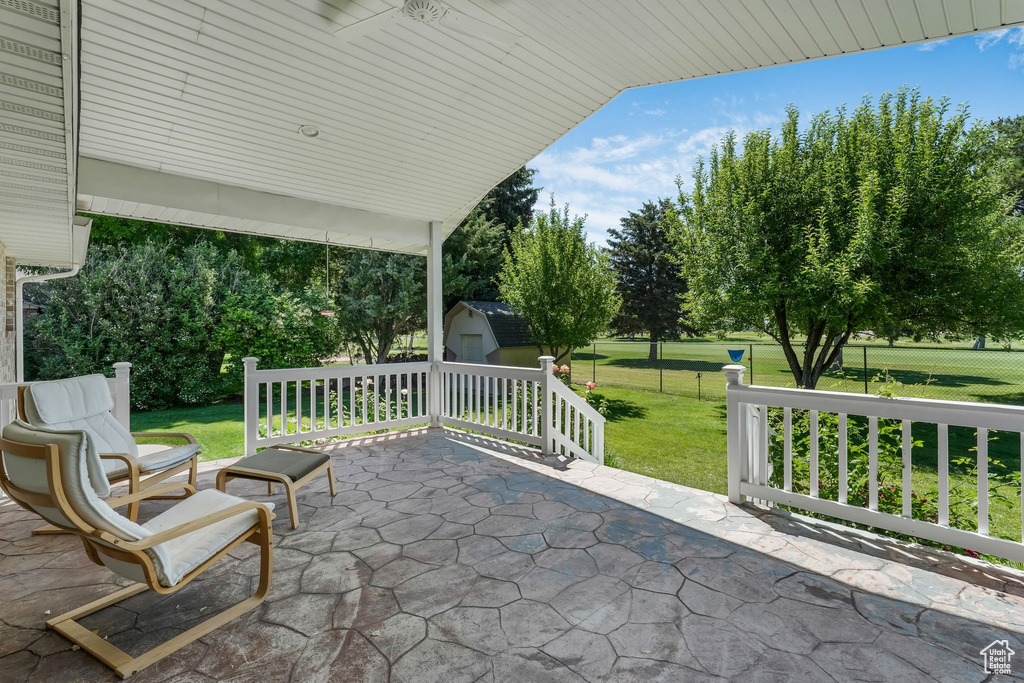 View of patio / terrace with a shed
