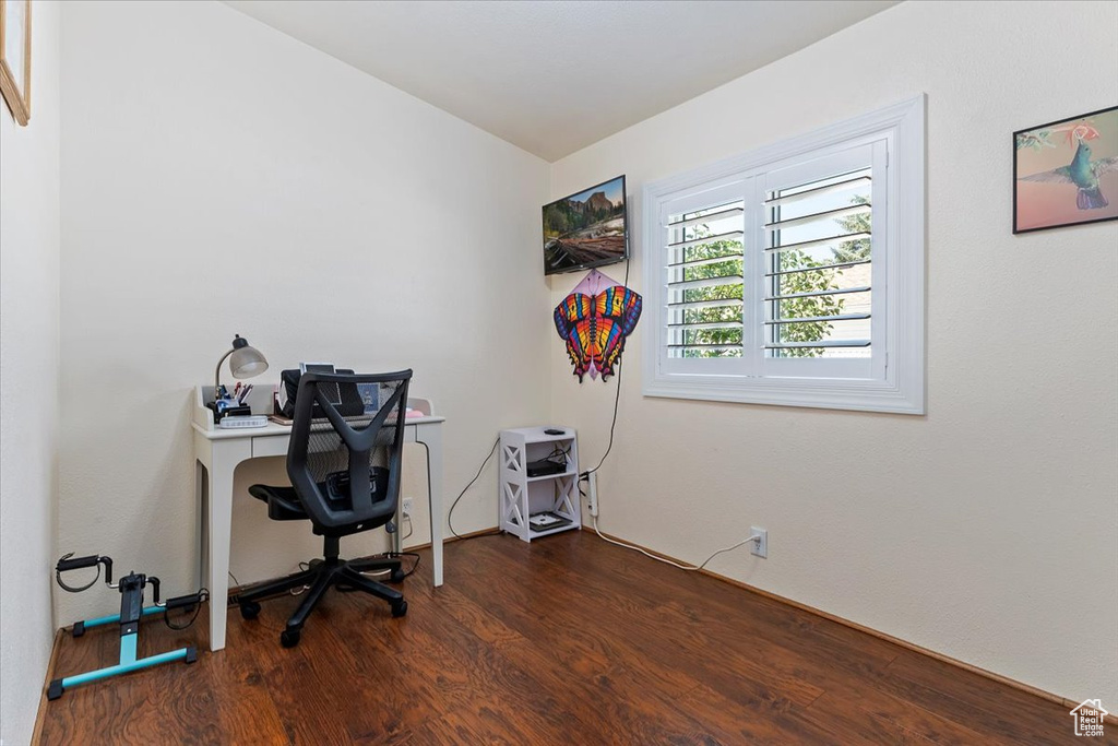 Office space with wood finished floors
