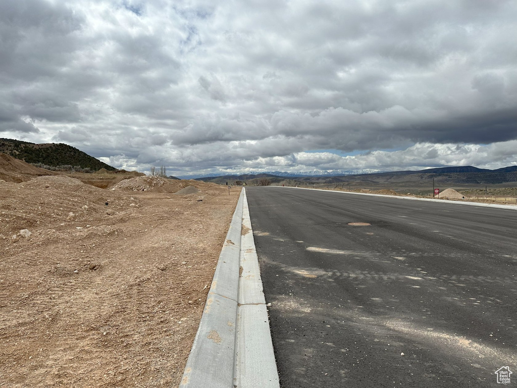 View of asphalt road with a mountain view