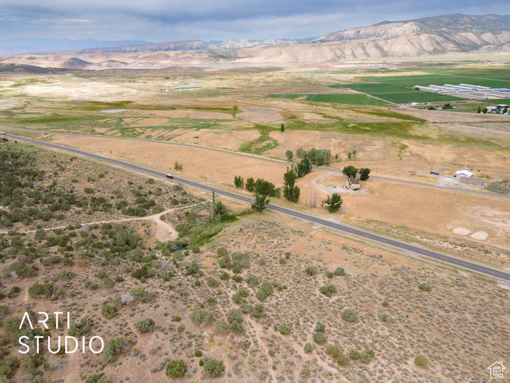 Aerial overview of property's location with mountains and rural landscape