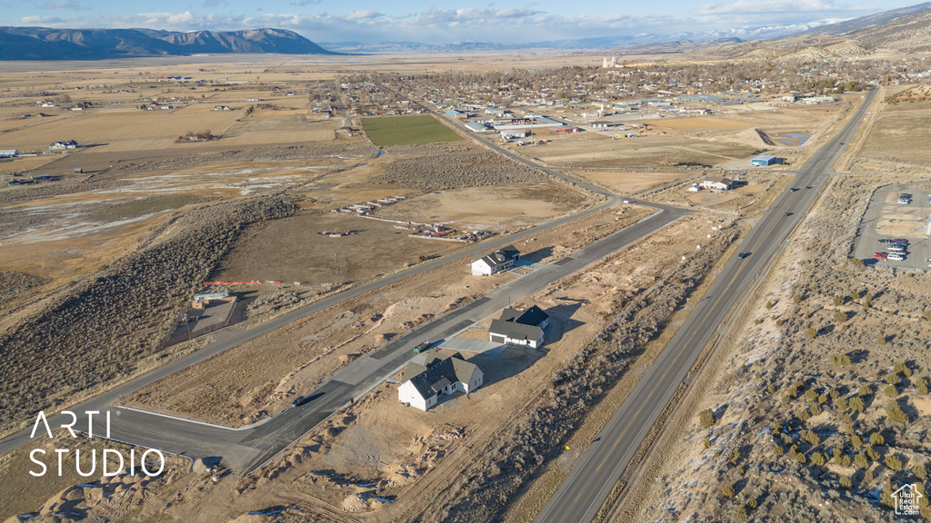 Aerial overview of property's location featuring mountains and rural landscape