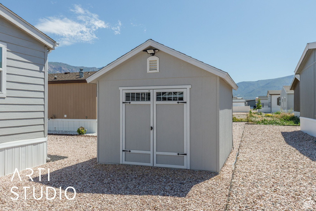 View of shed featuring a mountain view
