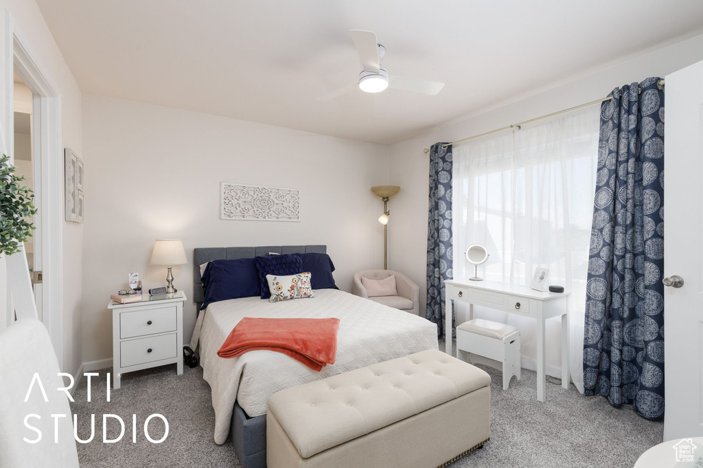 Bedroom featuring carpet floors and ceiling fan