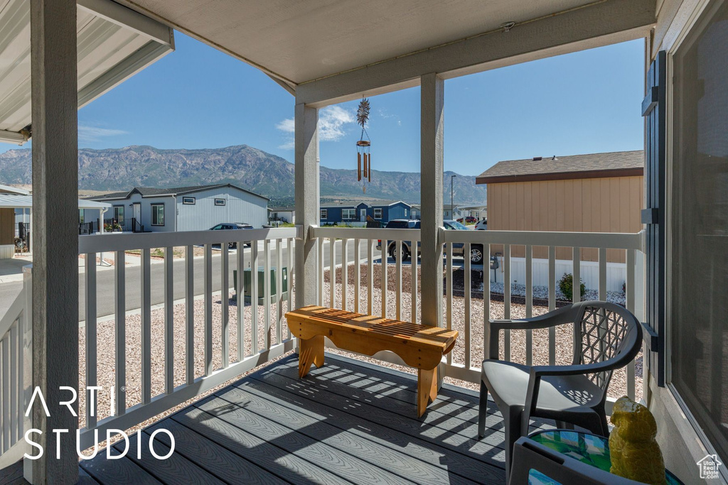 Balcony with a mountain view and a residential view