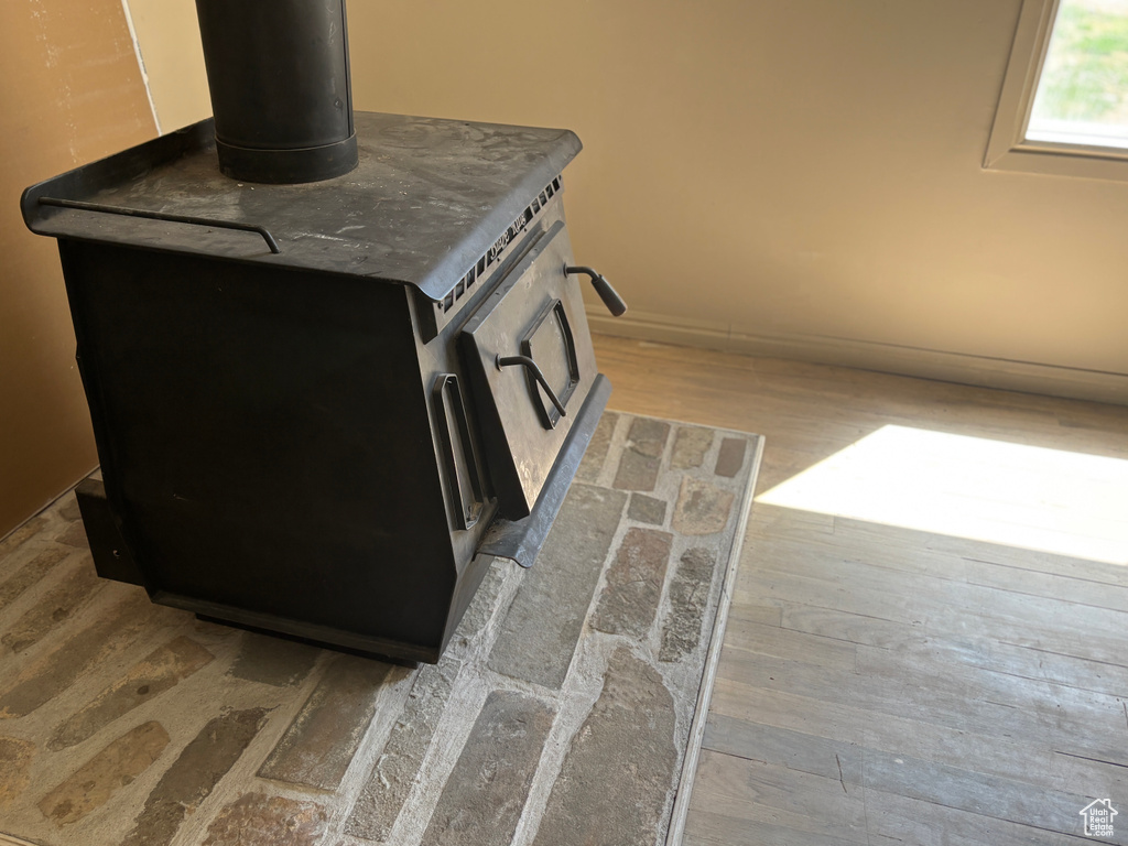 Detailed view of wood finished floors and baseboards