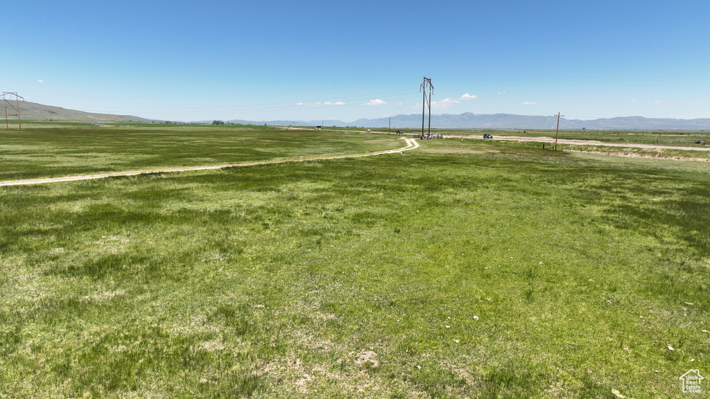 View of home's community with a rural view and a mountain view