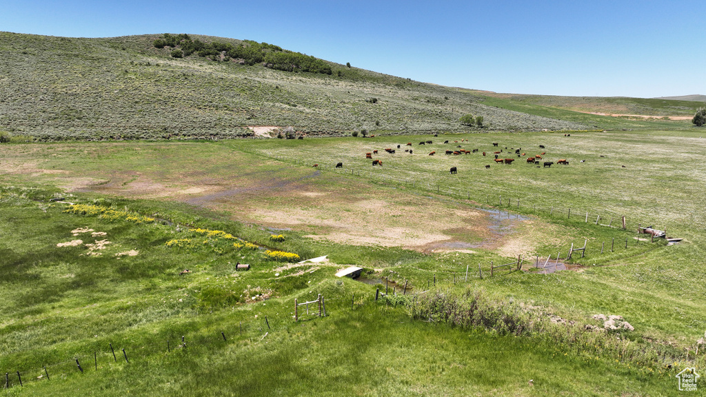 View of mountain background with rural landscape and a pastoral area