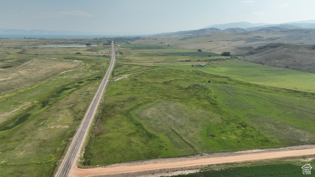 View of property location with rural landscape and mountains