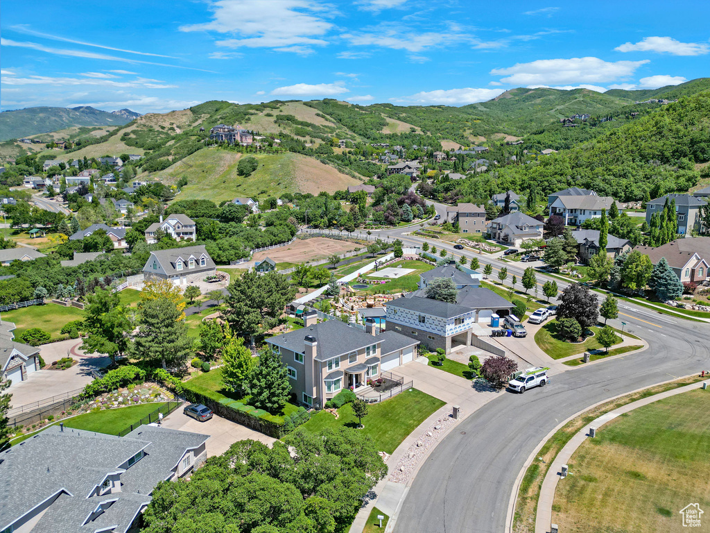 Aerial perspective of suburban area with mountains