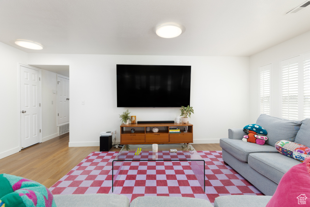 Living room featuring wood finished floors
