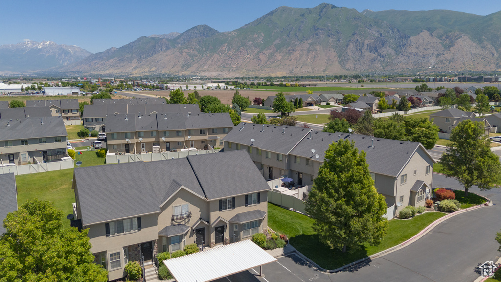 Aerial view of residential area featuring mountains