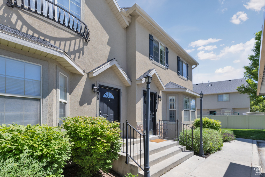 View of front of property with stucco siding