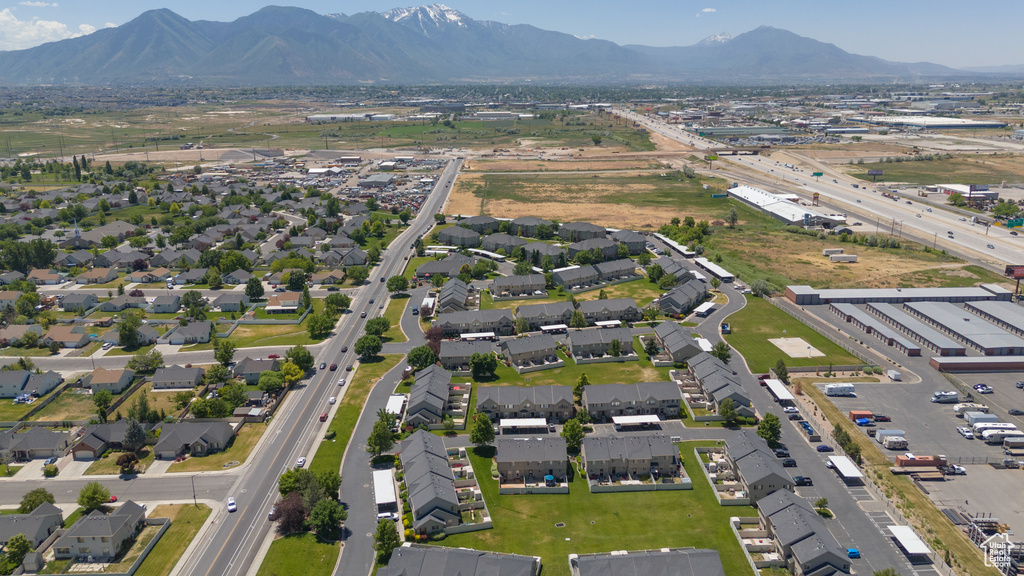 Aerial overview of property's location with nearby suburban area