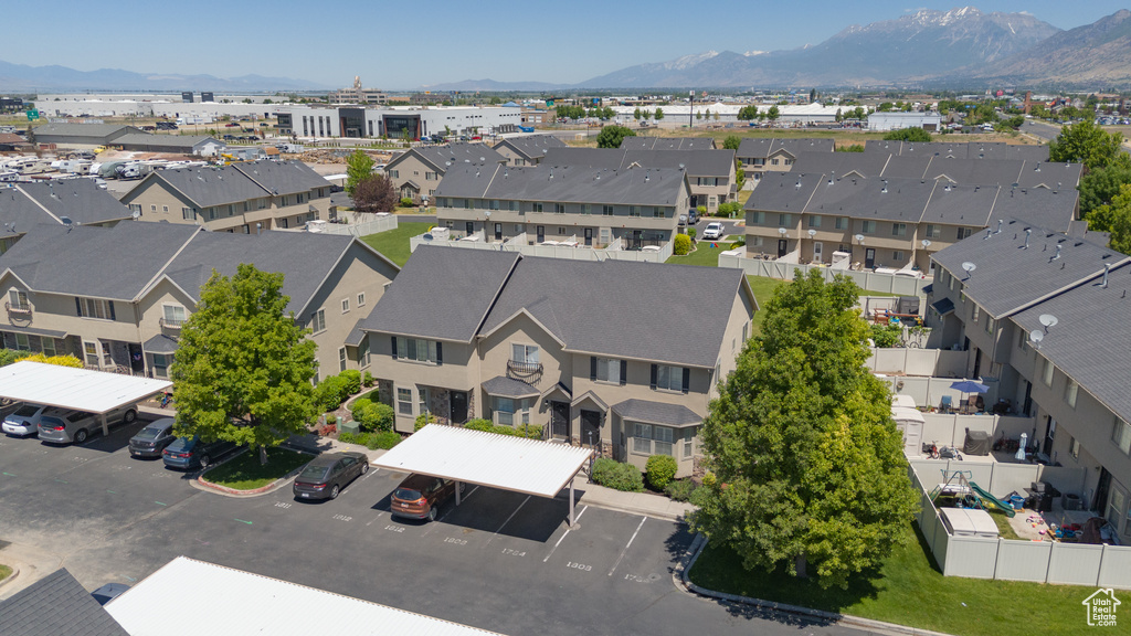 Aerial view of residential area with a mountain backdrop